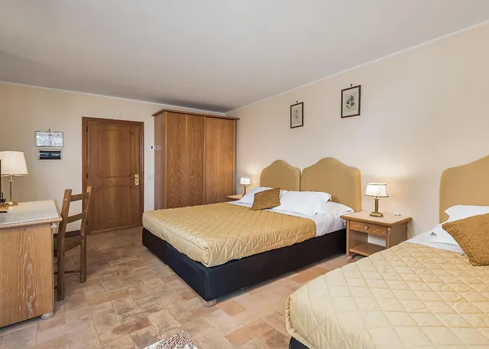 Отель Relais La Fattoria Кастель-Ригоне